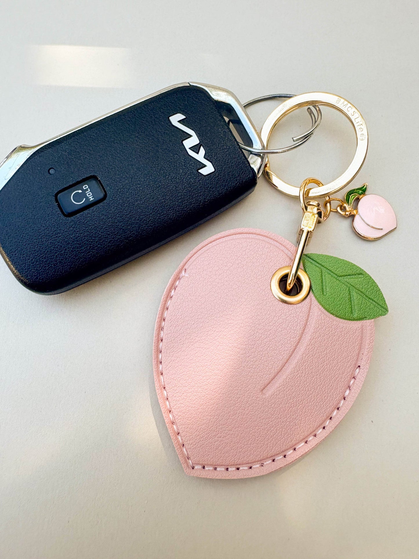 Peach Vegan Leather AirTag Case Keychain — Cute AirTag Holder with Fruit Charm - PACK OF JOY