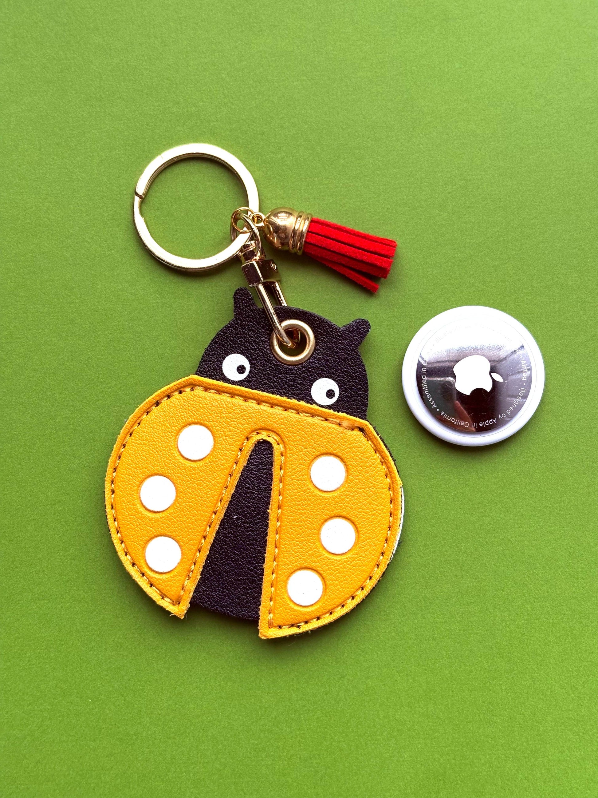 Yellow Ladybug Vegan Leather AirTag Holder Keychain — Cute AirTag Case with Charm - PACK OF JOY