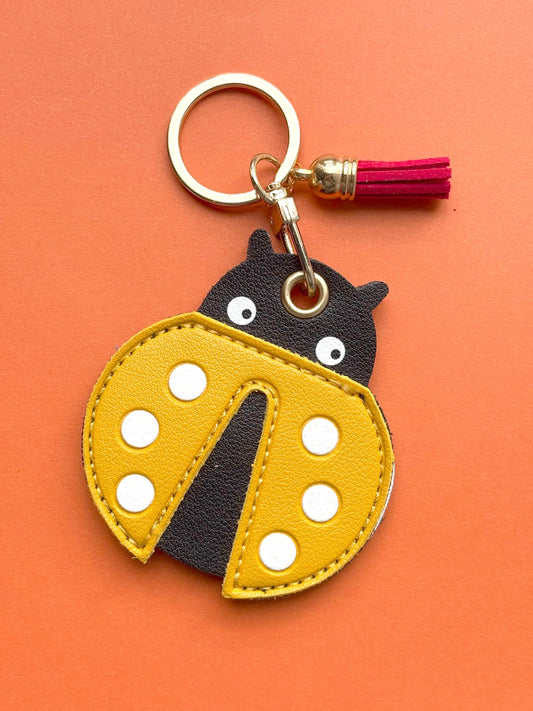 Yellow Ladybug Vegan Leather AirTag Holder Keychain — Cute AirTag Case with Charm - PACK OF JOY