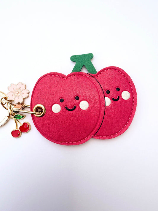 Cherry Pink Vegan Leather AirTag Holder Keychain — Stylish AirTag Case with Tassel Charm - PACK OF JOY